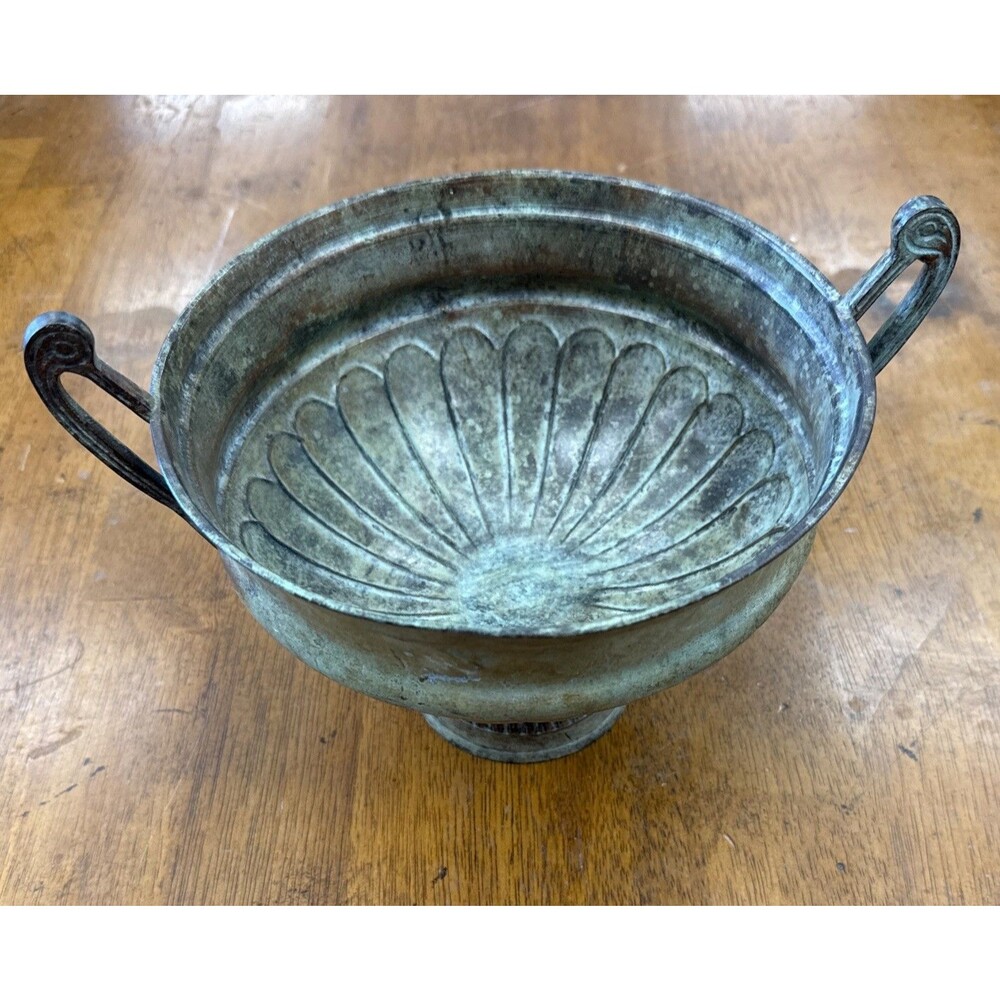 VTG Metal bowl with a radial embossed design and green patina